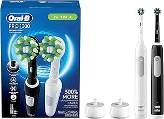 Pro 1000 Crossaction Electric Toothbrush, Powered by Braun, Black and White, 2 Count